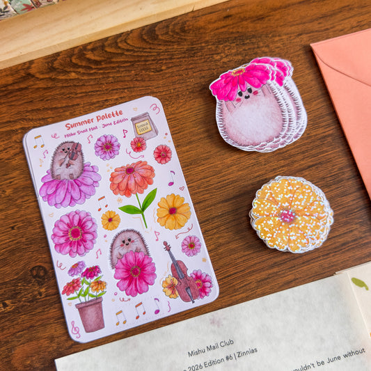 Sticker sheet with hedgehog and flower designs on a wooden surface