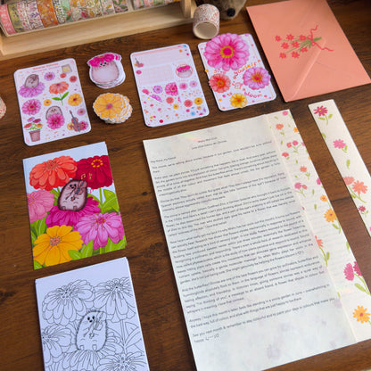 Floral cards and stationery items on a wooden surface