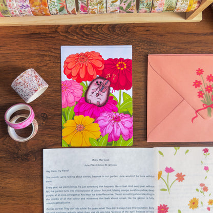 Colorful art print with a hedgehog playing a violin among flowers on a wooden surface.