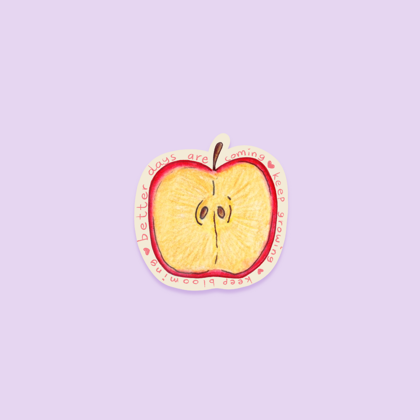 Sliced apple sticker with a motivational quote on a purple background