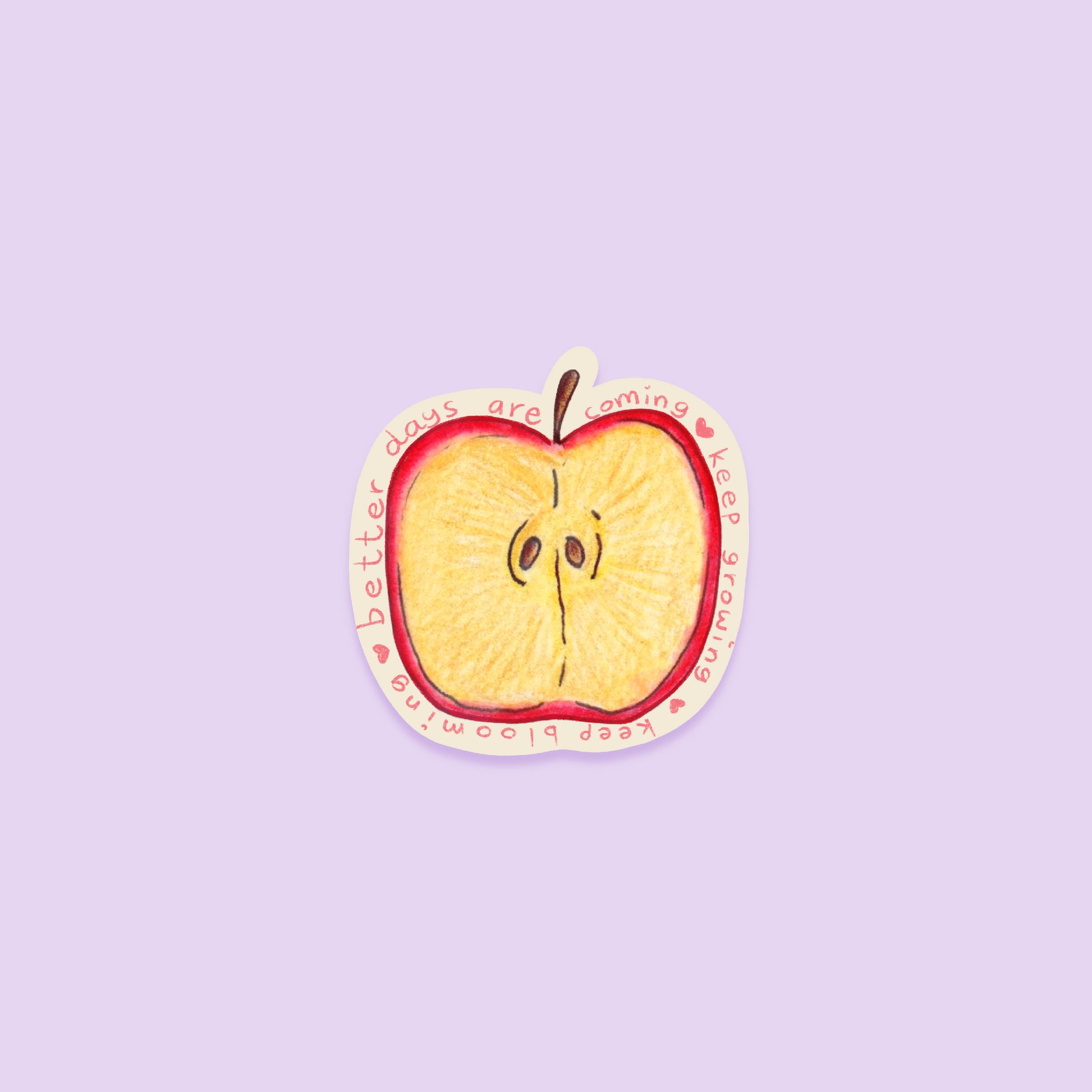 Sliced apple sticker with a motivational quote on a purple background