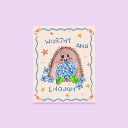 sticker with a hedgehog holding flowers and text 'Worthy and Enough' on a light purple background