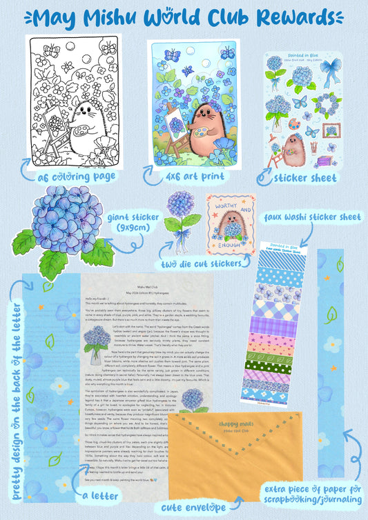 May Mishu World Club rewards flat lay showing 4x6 art print, A6 coloring page, sticker sheet, giant 9x9cm die cut sticker, two die cut stickers, faux washi sticker sheet, themed letter, and journaling paper